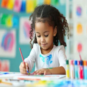 Children doing arts and crafts in a class