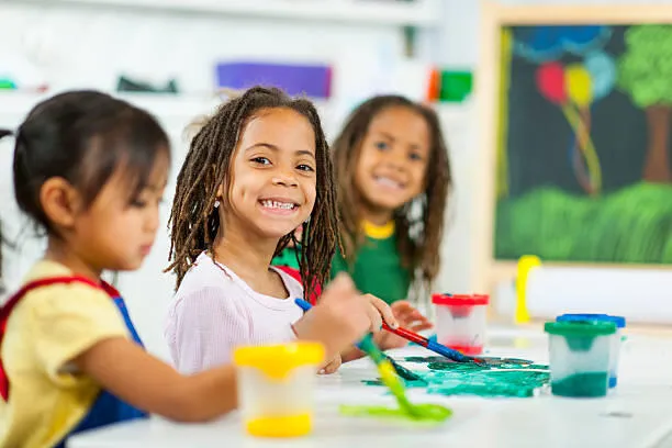 Diverse group of preschoolers playing.